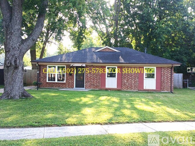 A house with a sign that says "For Sale" on the front.