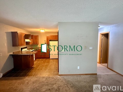 A sign that says "STORMO" is in the middle of a room.