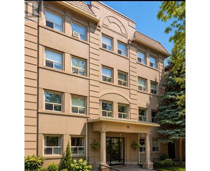 A beige building with the number 98 on the front.