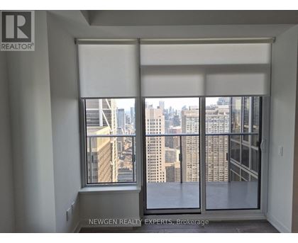 A window with a view of a cityscape.