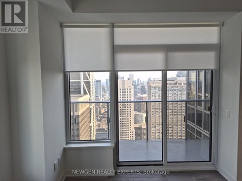 A window with a view of a cityscape.