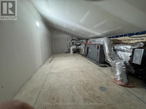 A room with a lot of duct tape and pipes.