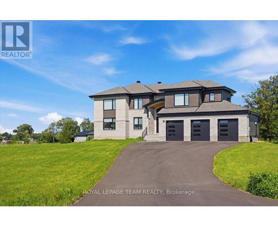 A large house with a driveway in front of it.