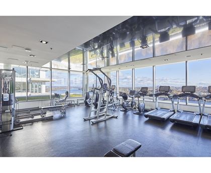 A gym with a view of the city.
