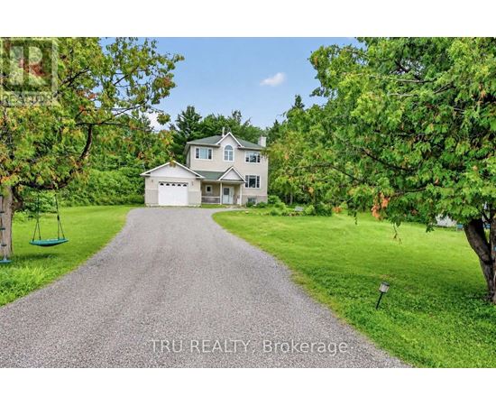 A house with a driveway in front of it.