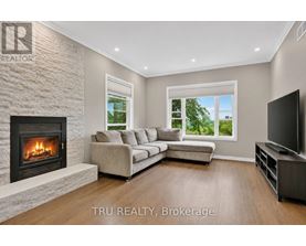A living room with a fireplace and a couch.