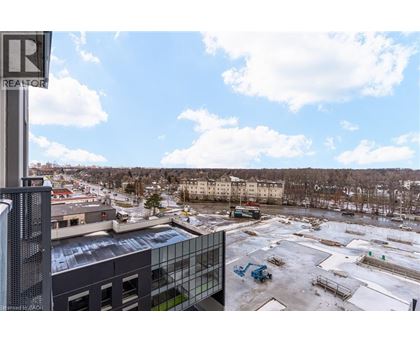 A parking lot with a building and a sign that says REALTOR.