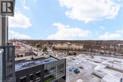 A parking lot with a building and a sign that says REALTOR.