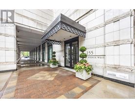 The entrance to a building with a sign that reads "Avenue West".