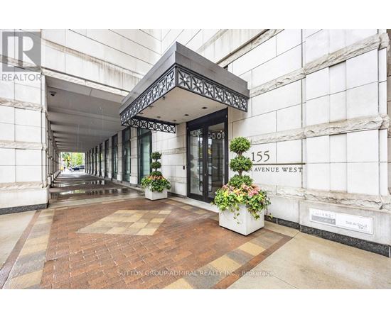 The entrance to a building with a sign that reads "Avenue West".