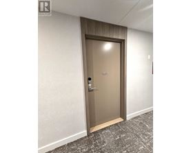 A brown door with the number 1507 on it.