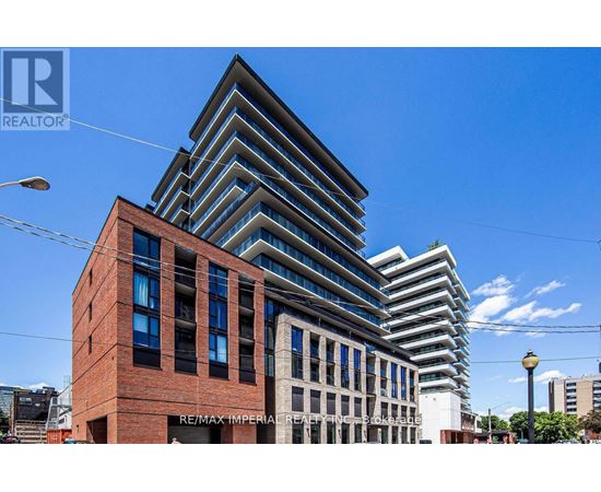A modern building with a sign that reads RE/MAX Imperial Realty.