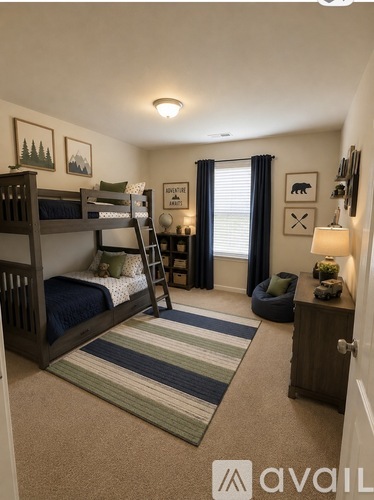A bedroom with two bunk beds and a ladder.