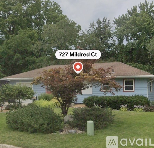 A house with the address 727 Milred Ct is shown in the image.