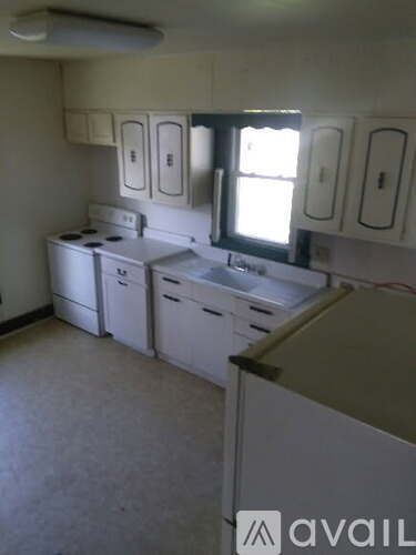 A laundry room with a washer and dryer in it.
