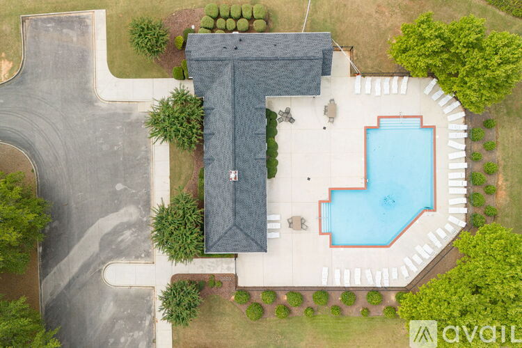 A house with a pool in the backyard.