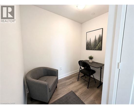 A small room with a chair and a table.