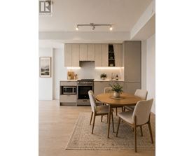 A modern kitchen with a dining table set for four.