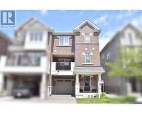 A large, multi-story house with a brick facade and a garage is the main focus of the image.