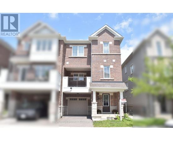 A large, multi-story house with a brick facade and a garage is the main focus of the image.