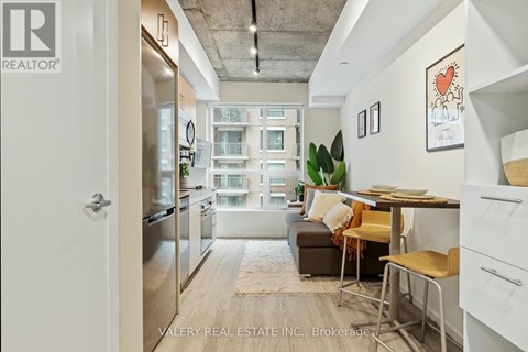 A modern kitchen with a view of the city.