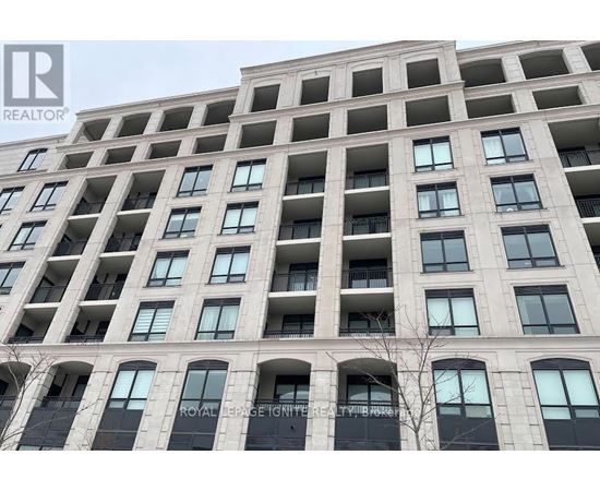 A tall building with many windows and balconies, with the words "ROYAL LEASE PARK" visible on the facade.