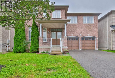 A house with a brown garage door is shown.