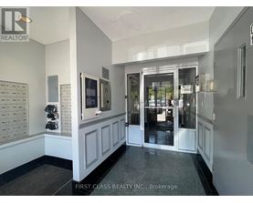 A brokerage office for First Class Realty Inc.