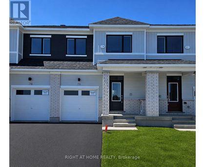A two-story house with a garage on the first floor.