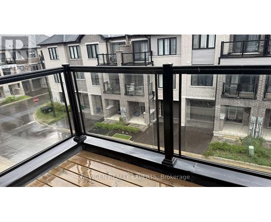 A rainy day in a residential area with apartment buildings.
