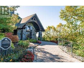 A stone building with a sign that says Cliffside Grill.