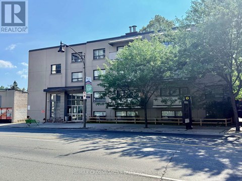 A building with a RE/MAX sign on the front.