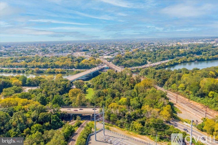 A panoramic view of a city with a river running through it.