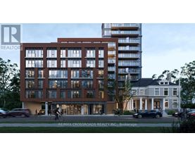 A modern building with a glass facade is depicted in the image.