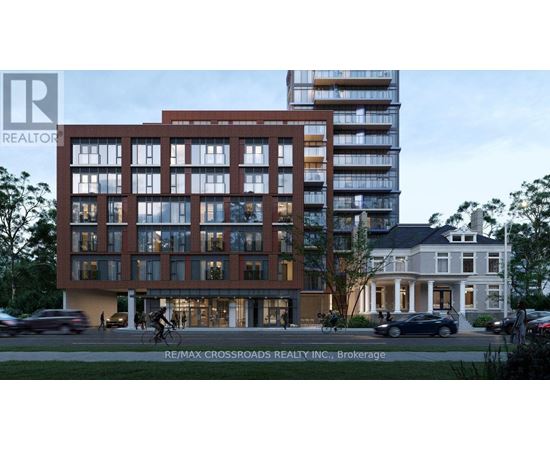 A modern building with a glass facade is depicted in the image.