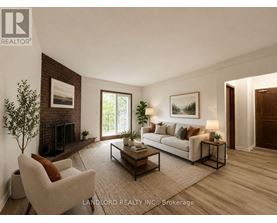 A living room with a couch, chair, and coffee table.