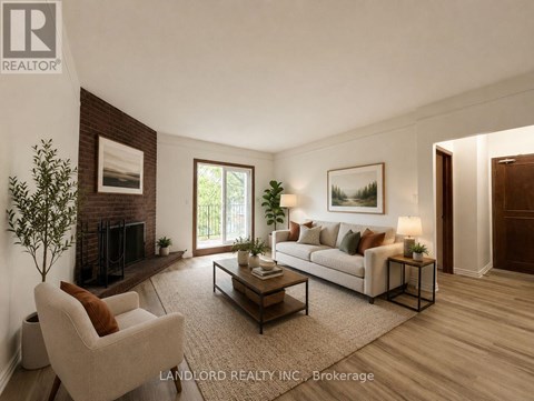 A living room with a couch, chair, and coffee table.