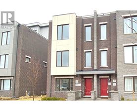 A building with a red door in front.