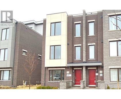 A building with a red door in front.