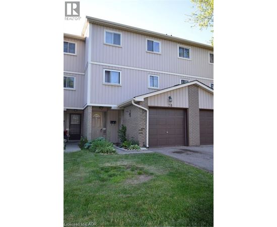 A two-story residential building with a garage.