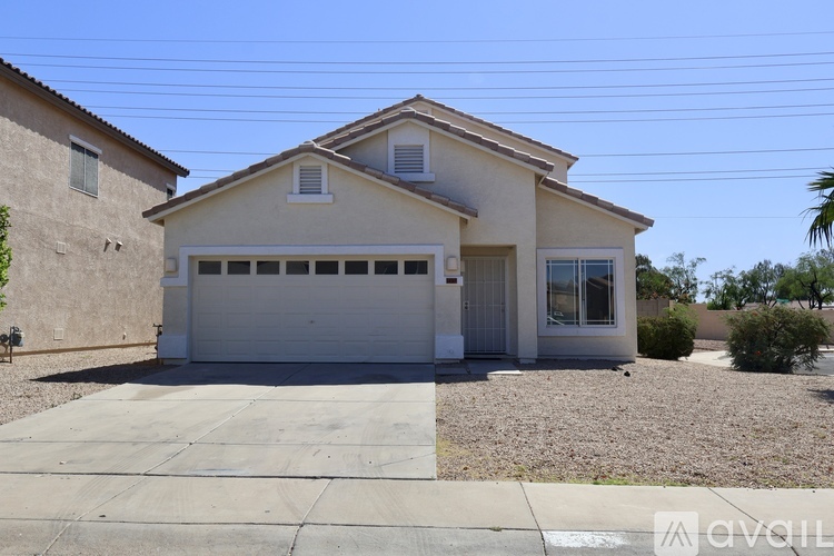 A house with a garage is available for sale.