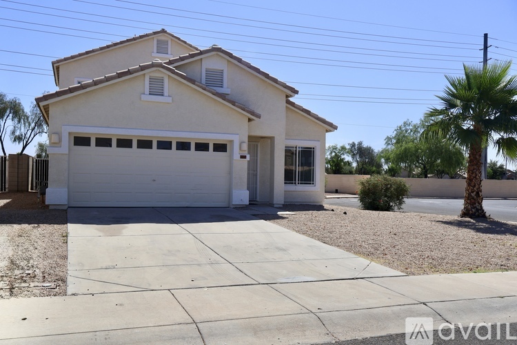 A two-car garage is attached to a house.