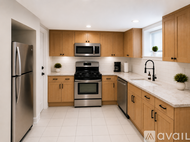 A kitchen with wooden cabinets and stainless steel appliances.