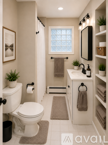 A bathroom with a toilet, sink, and mirror.