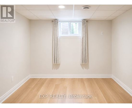 A room with EXP REALTY, Brokerage watermark on the floor.