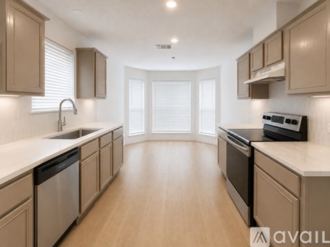 A kitchen with wooden cabinets and appliances.