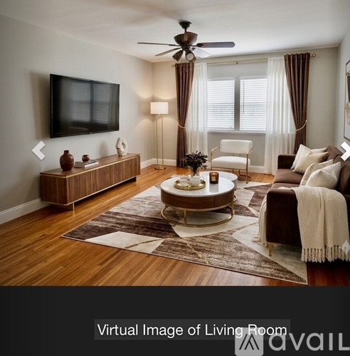 A living room with a brown and white color scheme.
