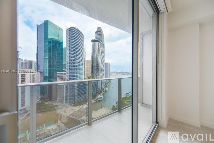 A view of a cityscape from a high-rise building.