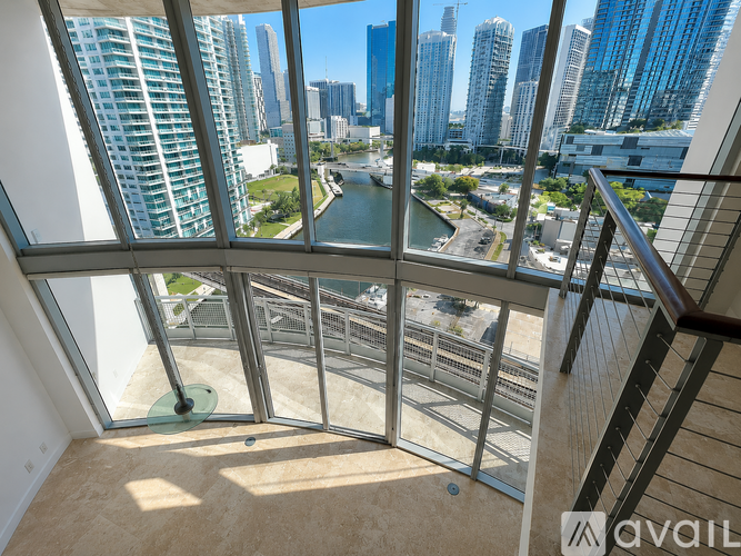 A view from a high-rise building looking out over a cityscape.