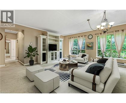A living room with a white couch and a coffee table.